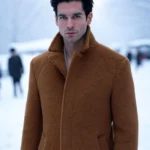 A sophisticated man standing confidently in an urban winter setting, wearing an elegant wool coat.